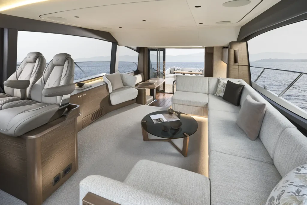 f58-interior-saloon-looking-aft-with-optional-chair-table-open-silver-oak