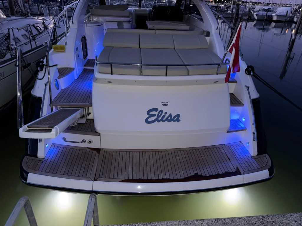 avcon-yacht-princess-v45-aft-cockpit-and-bathing-platform-at-dusk-03