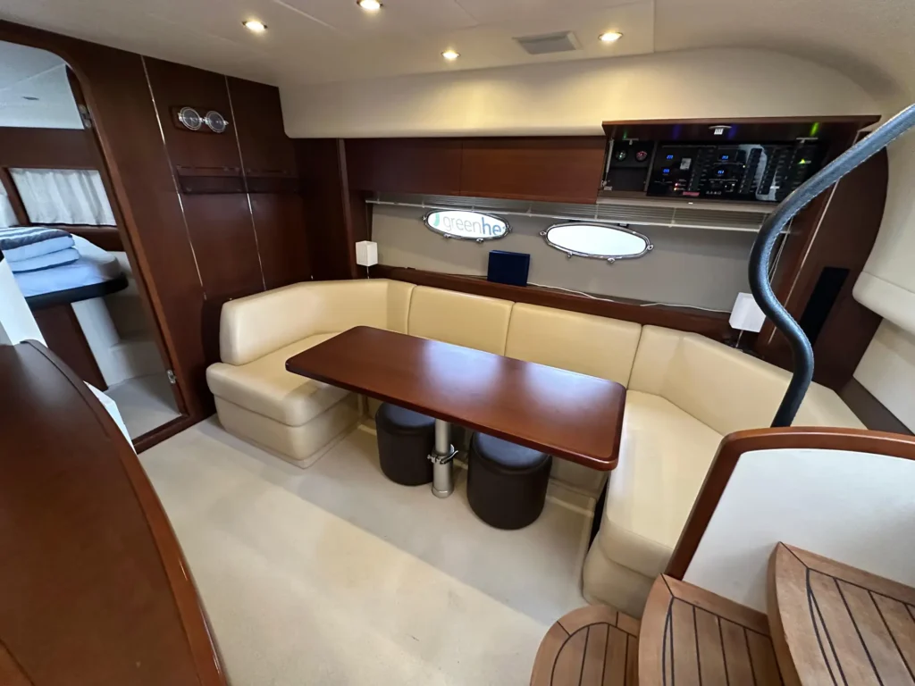 avcon-yacht-princess-v45-saloon-dinette-and-electrical-panel-08